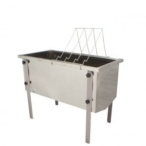 Universal Uncapping Table with Adjustable Frame Rest